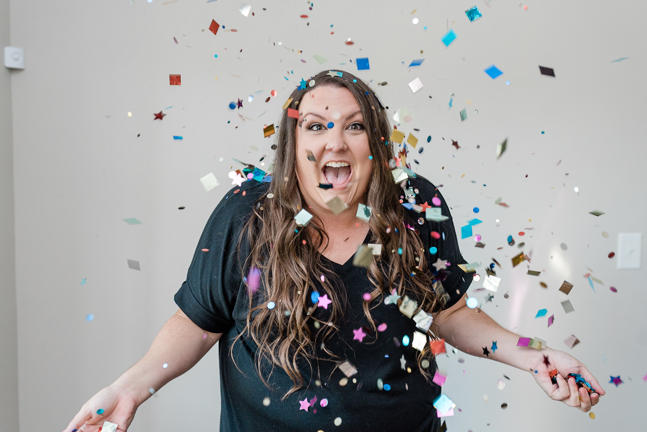 5 things to do to hit 100k Emily Conley celebrates with confetti Emily Writes Well